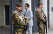 Man shot dead at paris airport after taking soldier’s gun, says official